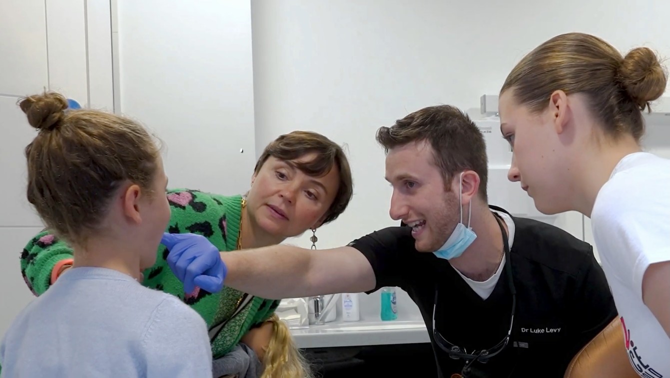 Dr Luke Levy with patient