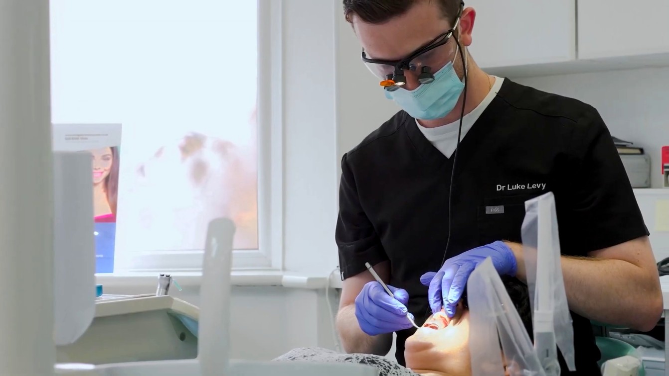 Dr Luke Levy with young patient